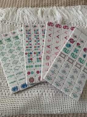 New, sealed mahjong tiles!  Fantastic deal.  Offers welcome.